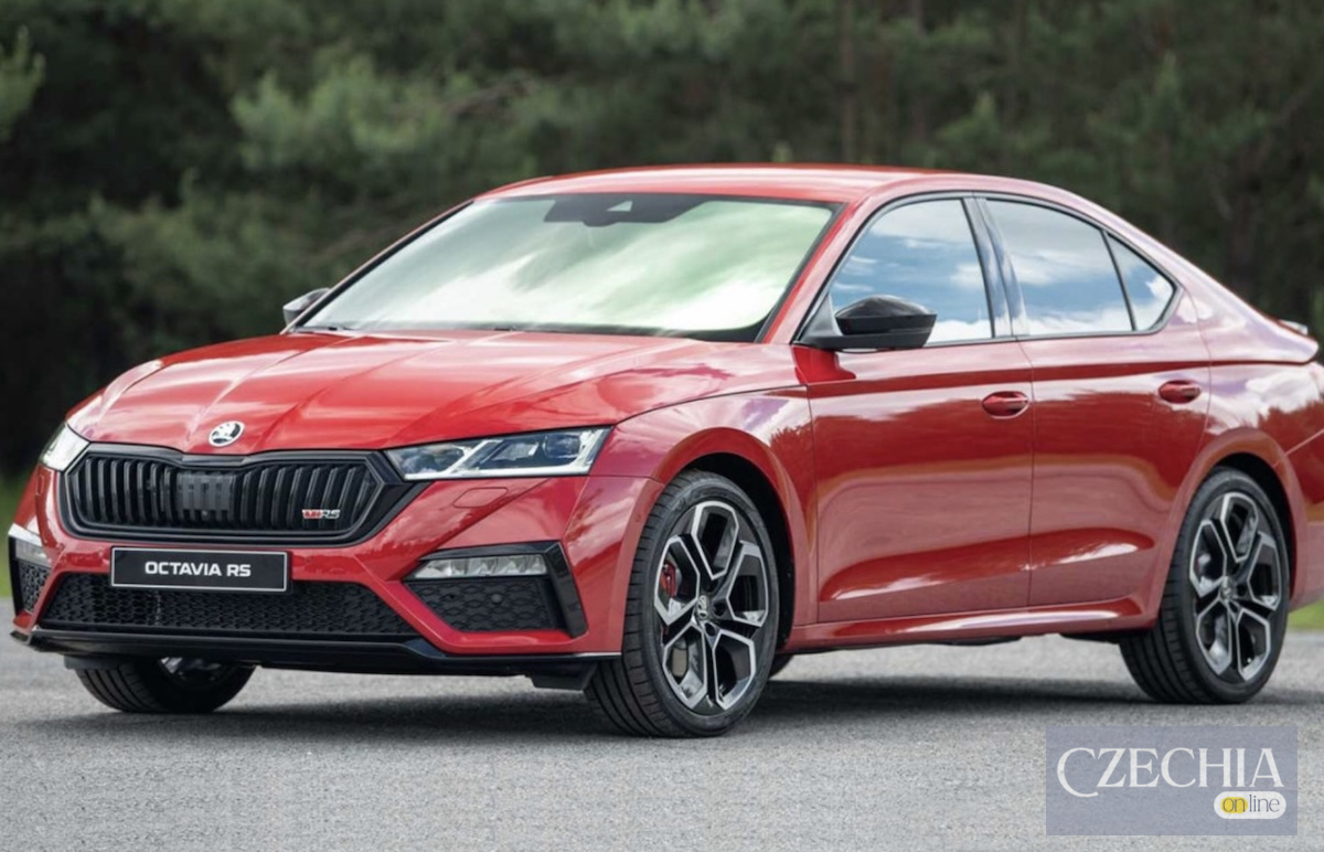Skoda Octavia RS ДВЗ авто Чехія Червоний автомобіль Škoda Octavia RS на фоні лісу.